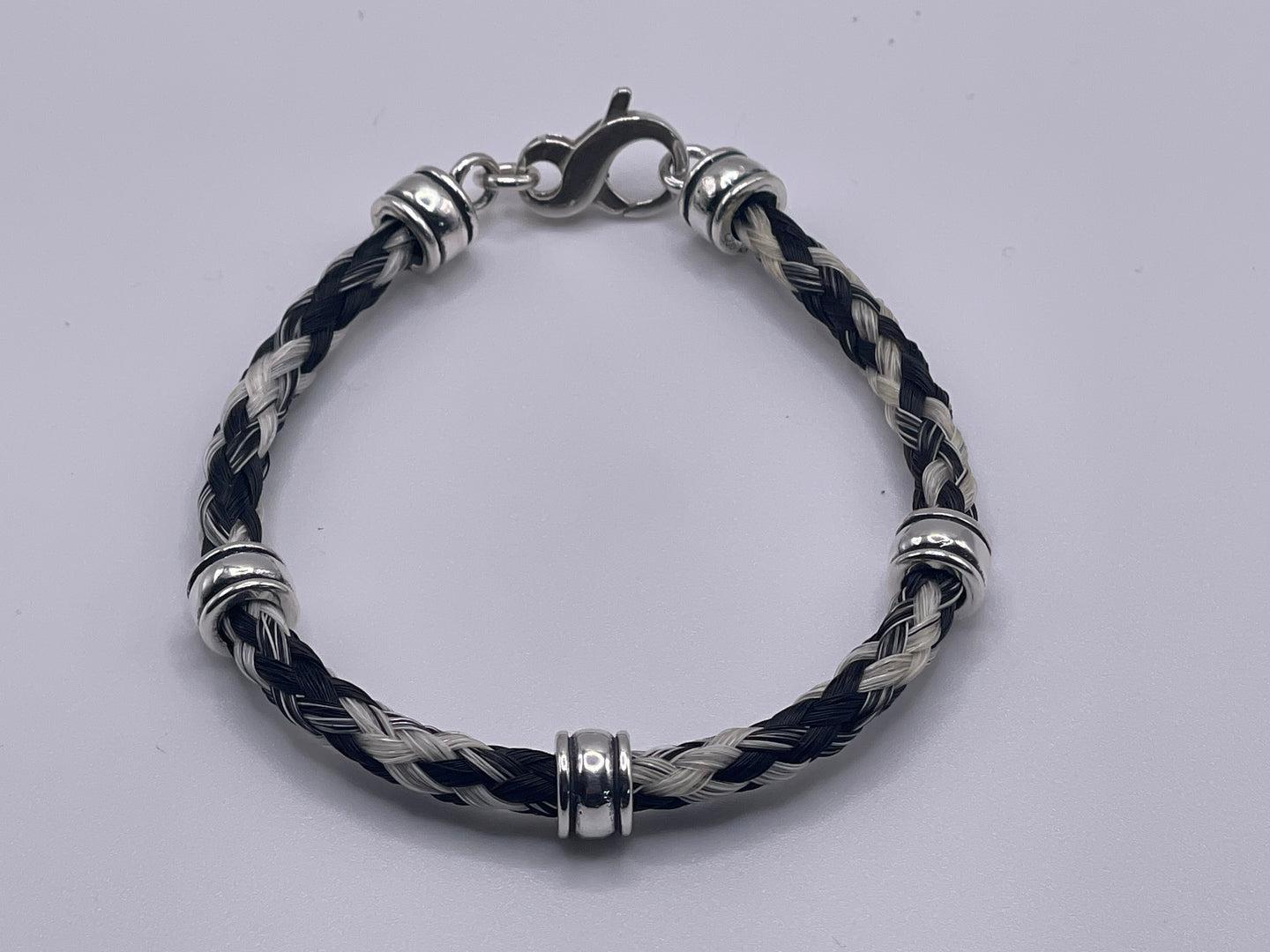 Bracelet with 3 Smooth Silver Spacers