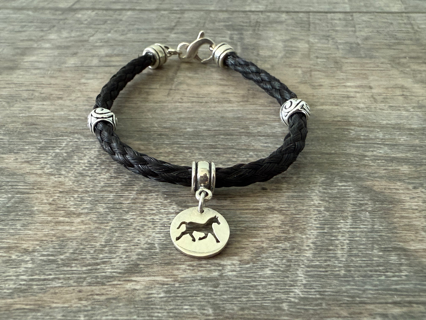 Bracelet with Silver Spacers and Horse Disk Bead