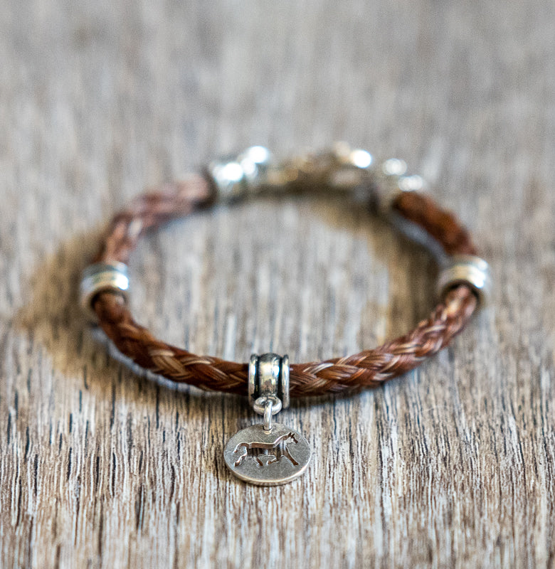 Bracelet with Smooth Spacers and Horse Disk Bead